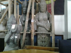 Large standing stone carved statue