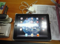 iPad 1st generation 64GB Wi-Fi with a charger and case