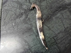 A lovely bronze dagger with horses head