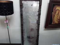The mirror with wooden frame