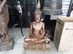 wooden sitting Buddha