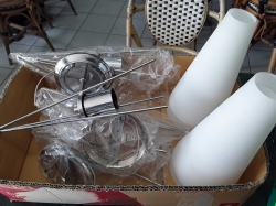 A set of 4 brand new chromium metal wall lights with milk glass shades