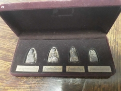 4 amulets in box 50 years old