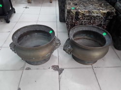 A pair of brass pot