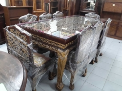 Teak wood dining table with 8 chairs