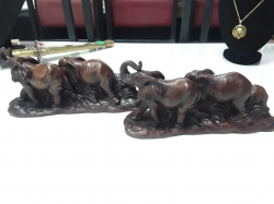 Very nice pair of elephant family ornaments on stand