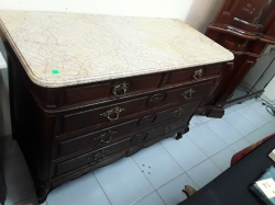Cabinet with marble on top and drawers