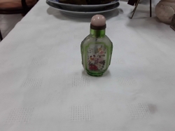 A very nice old snuff glass bottle painted by inside with birds, women and flower design