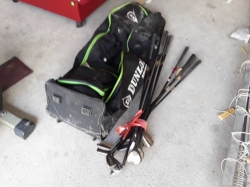 Job lot of golf clubs with golf bag