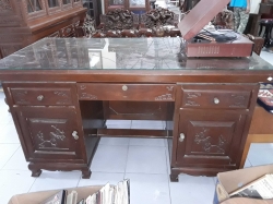 Large wooden desk with drawers