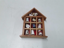 12 thimbles in hanging case