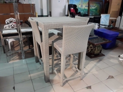 Rattan table with 3 chairs glass on top