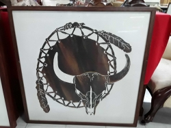 Frame painted of cowboy artifacts