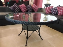 Round coffee table with glass on top