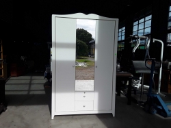 White wardrobe and small safe
