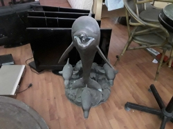 Large heavy bronze dolphins