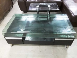 Coffee table with glass on top