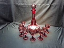 A Set Of Crystal Red Color 9 Wine Glasses And 1 Decanter Wine Bottle