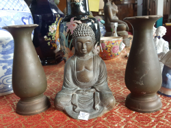 Bronze Buddha with flowers holders