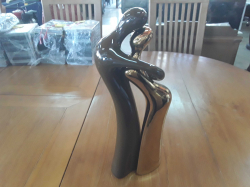 Brown and gold ceramic art deco