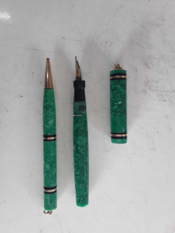 A pair of fountain pen 14ct gold cnib and machine pencil