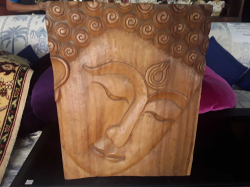 Wooden Buddha face