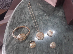 Lady necklace . ring .bracelet , earrings