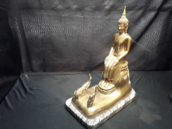 Buddha seated in accepting from an elephant and monkey