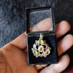 Sterling silver multi colored gem stones pendant with rubies, blue sapphires, citrine colour topaz and green zircom gems