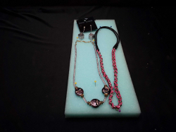 2 Beautiful pendants + earrings