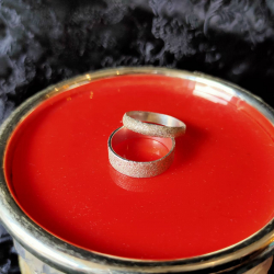 A pair of Sand textured silver band ring (Stamp 925 )