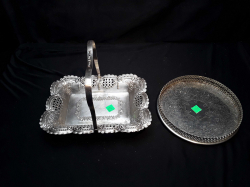 A silver plate square pierced basket & A round gallery tray Georgian style both on feet & both arround 1920s