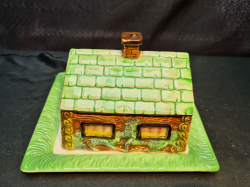 A vintage chese cloch bungalow by beswick ware stamped to base