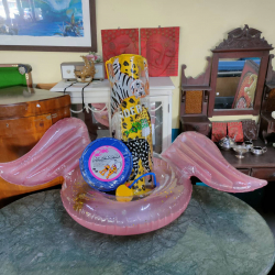 A pumper with a beach dome and an inflatable swimming pool
