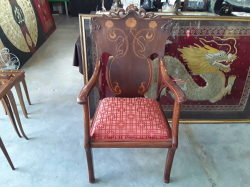 AN art Nouveau Armchair of birch with satinwood Inlay of popies and scroll with Illustrated