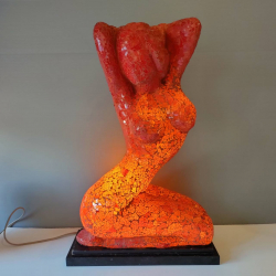 A decorative Red colour crackle textured mosaic glass Nude lady sculpture with sturdy black granite base