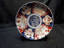 A 19th century 8.5 inch Japanese Imari plate & Stand 