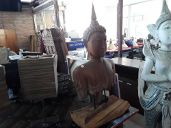 Wooden carved Buddha on stand 