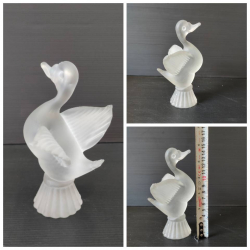 A lalique style duck glass figure