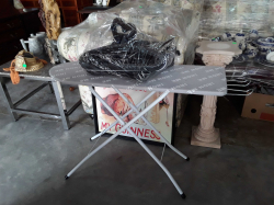 Iron Board with lot of clothes hanger