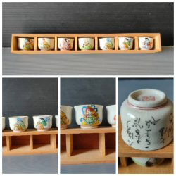 A set of seven Hand painted sake porcelain cups