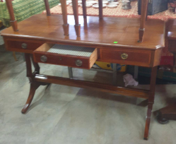 Regency style mahogany stretcher/Sofa table with 3 opening drawers with original brass handles