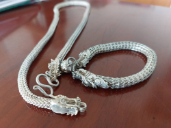 Silver dragon chain weight 92 g. lenght 57 cm with silver dragon bracelet weight 50 g.