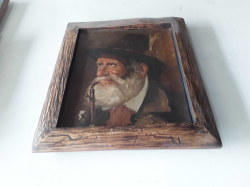 An oil on canvas framed of an old man smoking a pipe 