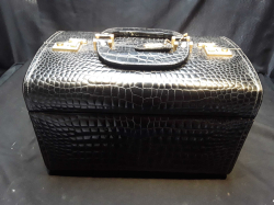 . An Italian FBM crocodile leather case with keys 