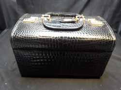 . An Italian FBM crocodile leather case with keys