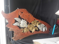   A Wooden Craved fish for decoration on the wall  