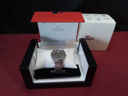 TISSOT SWISS Watches Since 1853 with Box.
(Brand New)