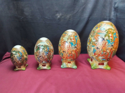 Four Oriental Graduated Ornaments.