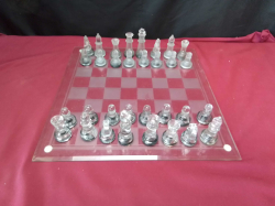 Glass Chess Set on Glass Chess Board .